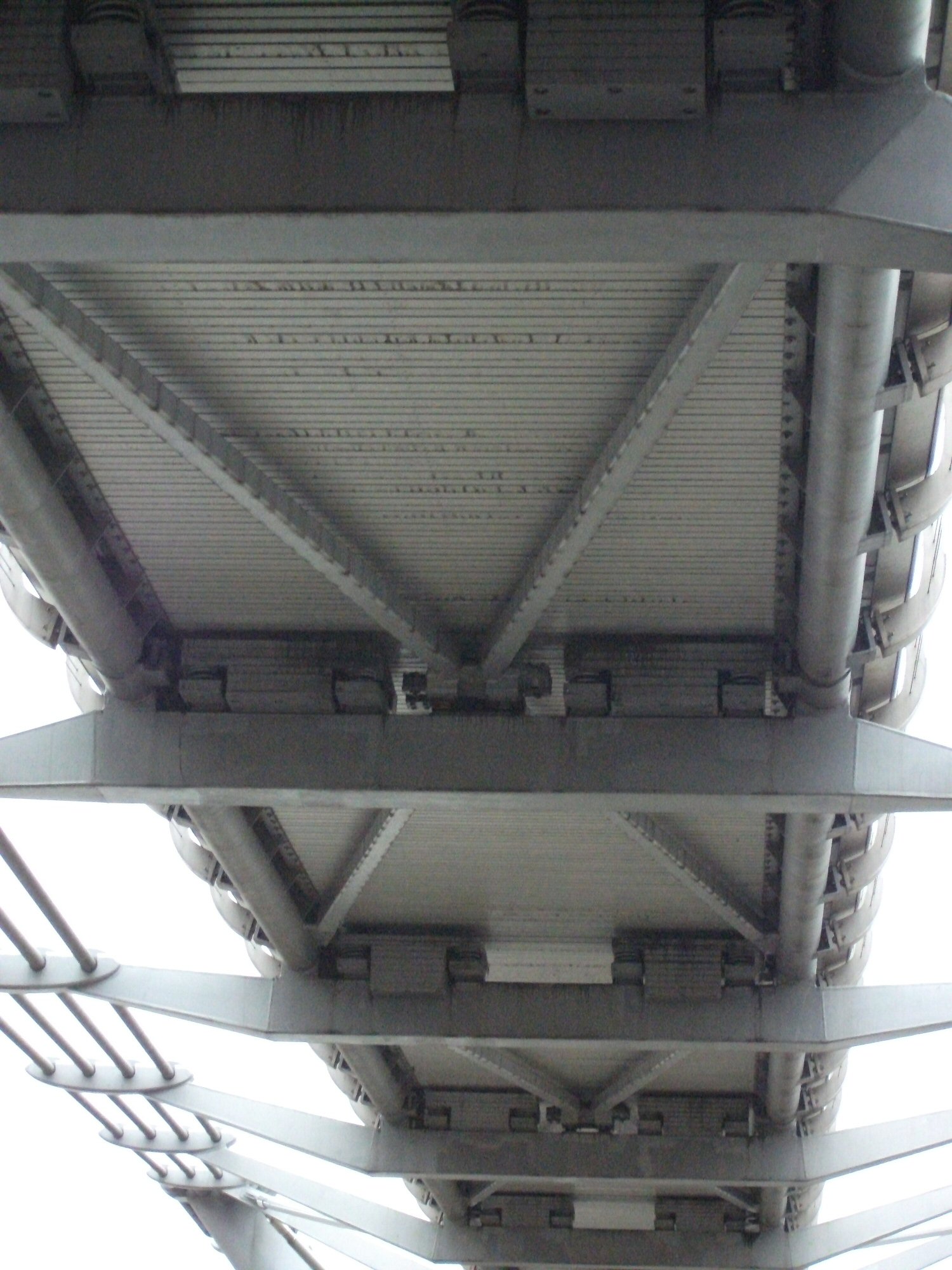Overlapping beams, deck panels, bracing, and dampers beneath the Millennium Bridge in London