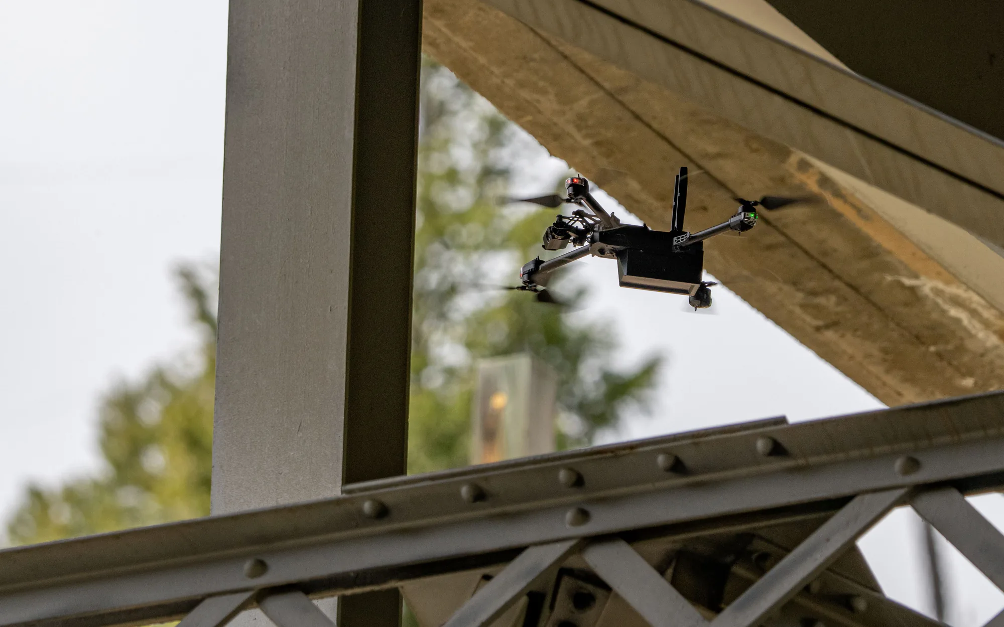 Multirotor UAS flying close to a bridge during a test and evaluation flight.